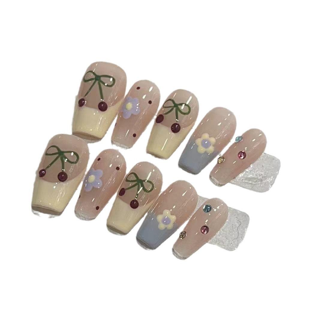 Charmantes dekoratives Press-On-Nagelset mit Kirsch- und Blumendesigns Brehn