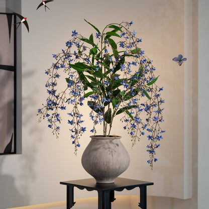 Lebensechte Orchideenblütenarrangement