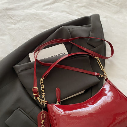 Glänzende lackierte Leder Crossbody-Handtasche