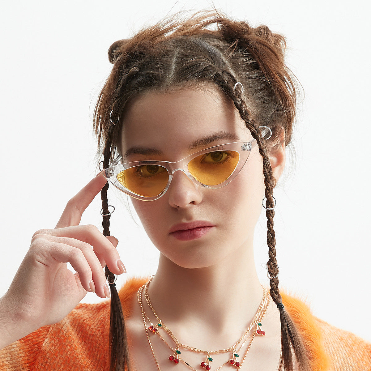 Damen Cat-Eye Sonnenbrille mit transparenter Rahmenkonstruktion und gelben Gläsern Brehn