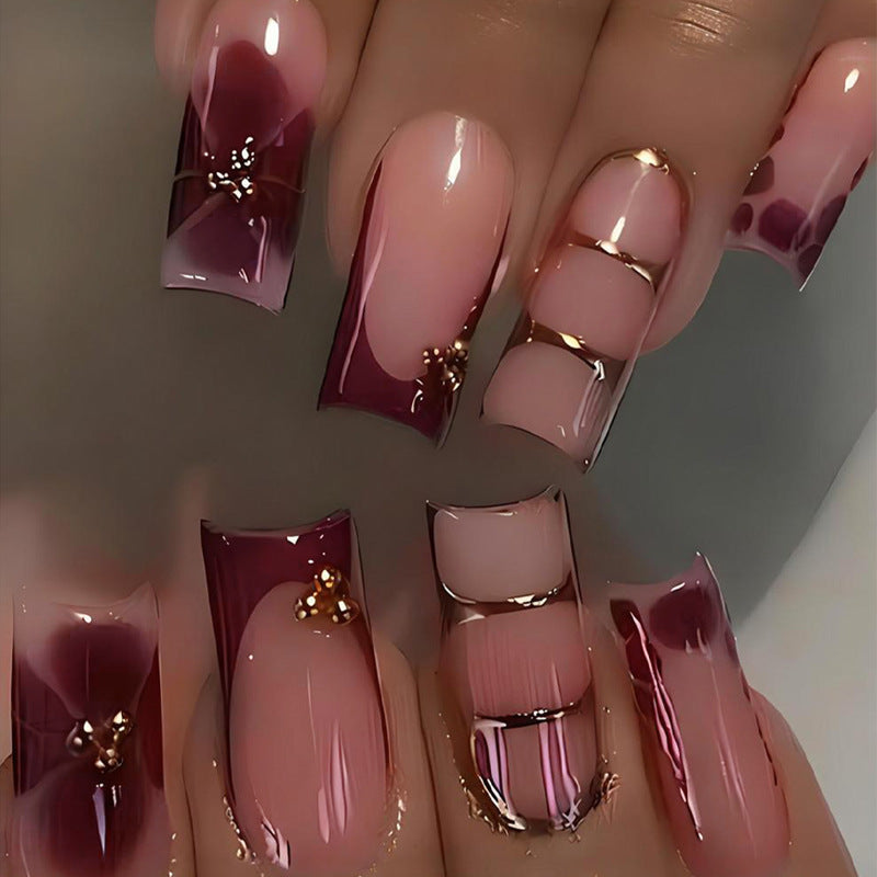 Kunstnagelset mit eleganten Farbverlauf und filigranen Verzierungen Brehn