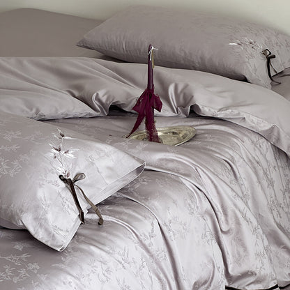Jacquard-Satin Bettwäschegarnitur mit floraler Applikation und Zierschleife