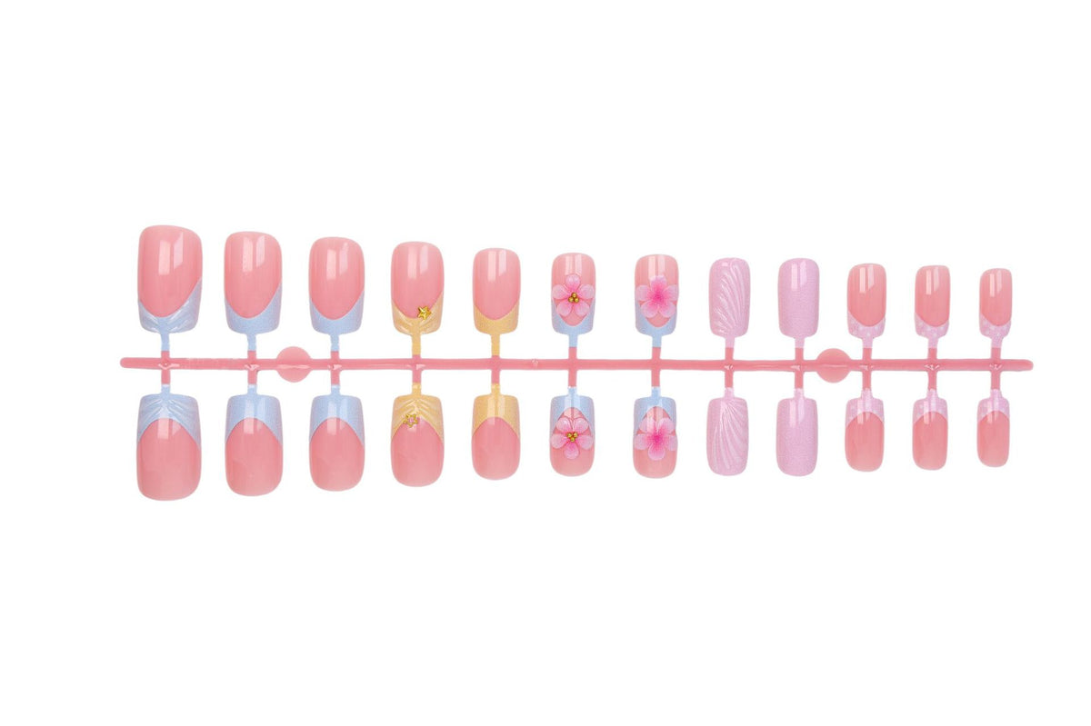 Kunstnagelset mit eleganten Blütenmotiven und farbenfrohen Designs Brehn