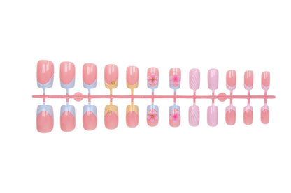 Kunstnagelset mit eleganten Blütenmotiven und farbenfrohen Designs Brehn