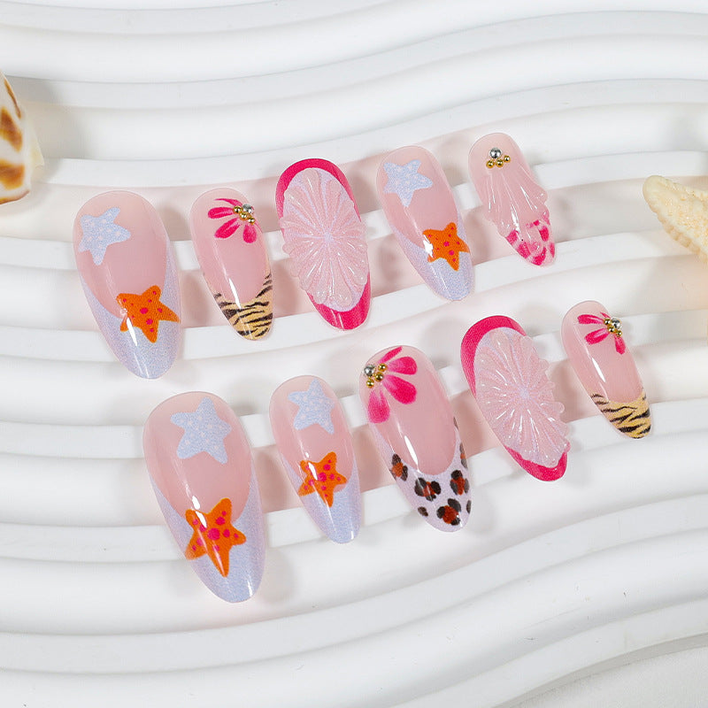 Kunstnagelset mit kreativen floralen und maritimen Designs Brehn