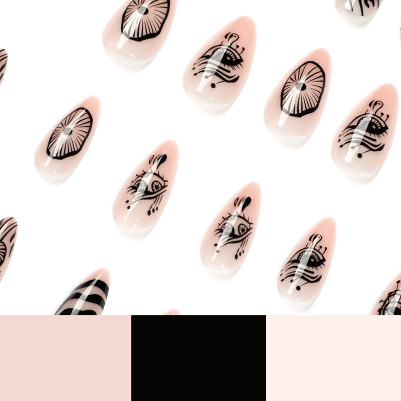 Kunstvolle Acryl-Nägel im eleganten Stiletto-Design mit grafischen Mustern Brehn