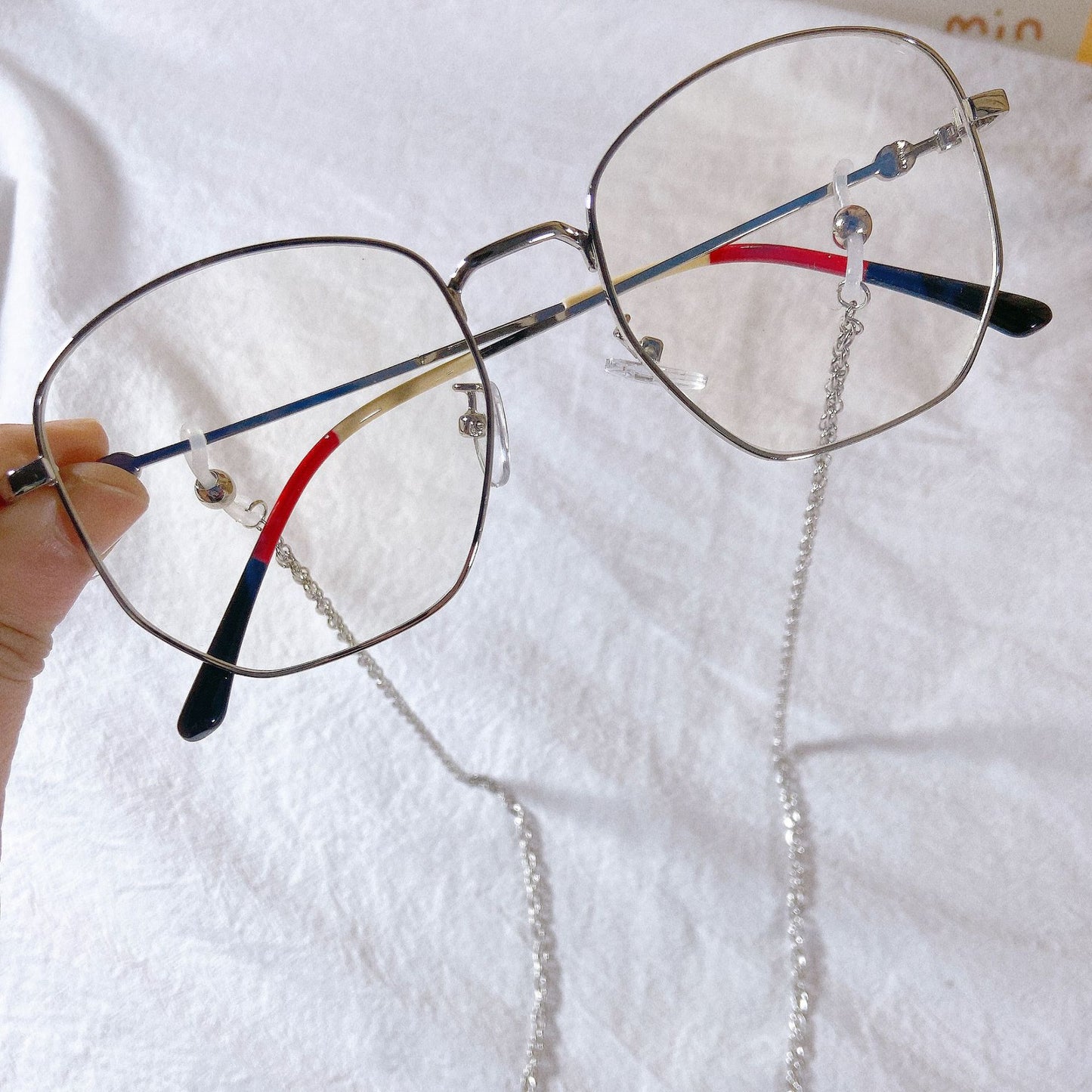 Modische Brillenfassung mit Kettenband Brehn