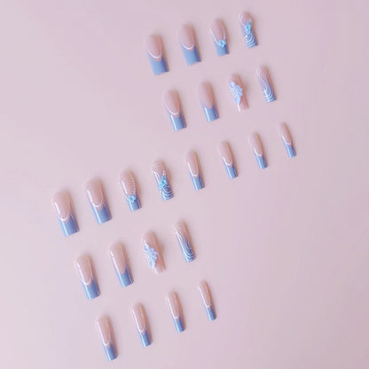Kunstnagelset mit zarten floralen Akzenten und eleganten Verzierungen Brehn
