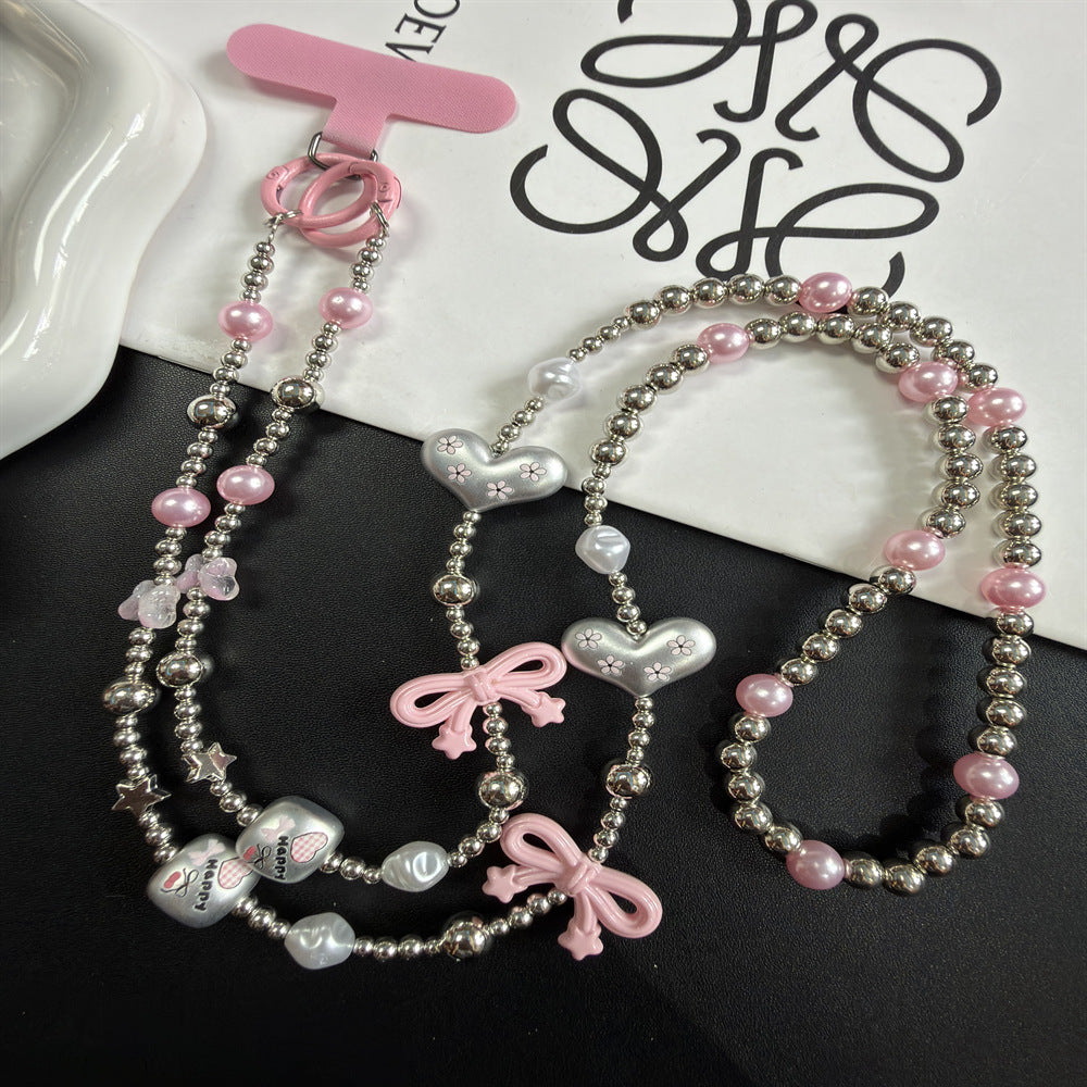 Mehrsträngige Perlenkette mit Charms Brehn