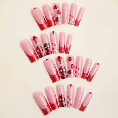 Luxus Press-On Nail Set mit glamourösen Herz- und Glitzerdesigns Brehn