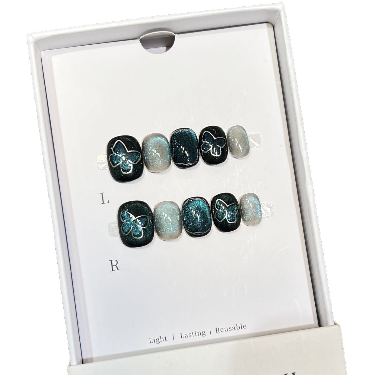 Dekoratives Press-On Nagelkunstset mit Schmetterlings- und Glitzerakzenten Brehn