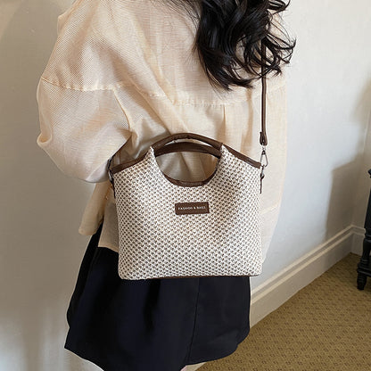 Stylishe gewebte Handtasche
