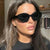 Damen geometrische Sonnenbrille mit trendigem, transparentem Rahmen Brehn