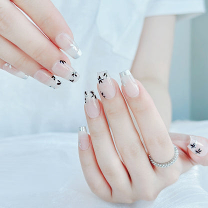 Künstlerisches Floral Press-On Nagelset mit glänzendem Finish