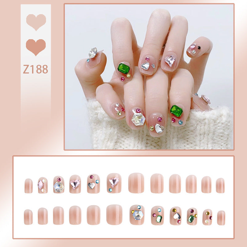 Kunstnagelset mit eleganten Glitzerverzierungen und schimmernden Akzenten Brehn
