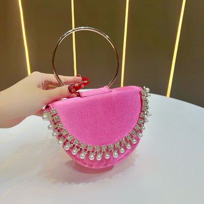 Perlenakzentierte Abend-Clutch