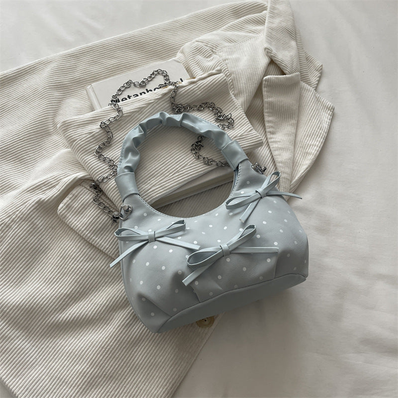 Stylische gepunktete Mini-Handtasche