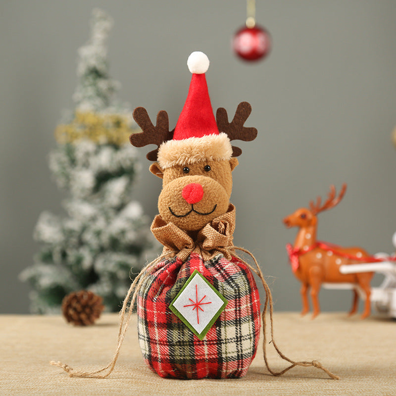 Niedlicher Weihnachtsgnom mit Geschenkesack Brehn