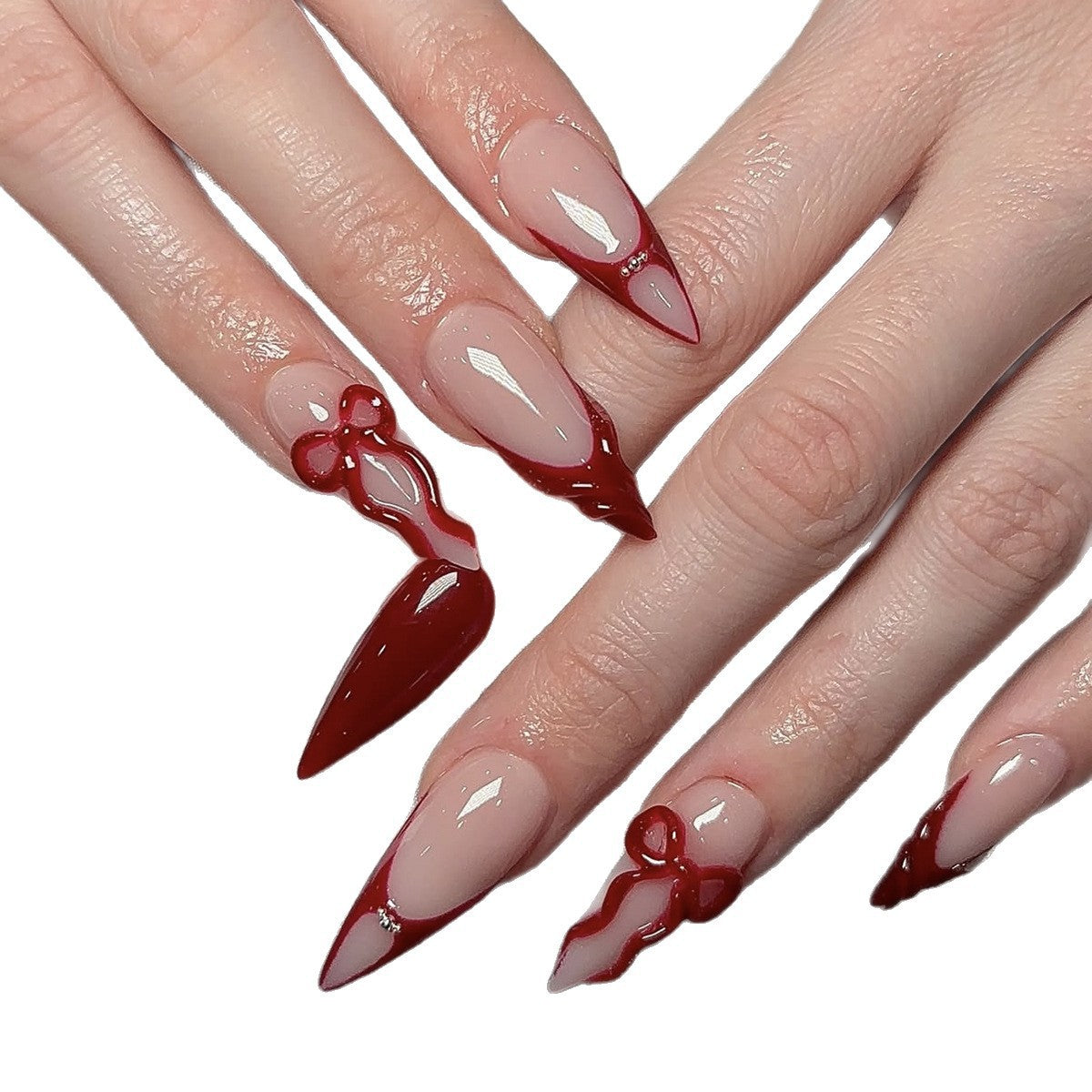 Hochwertiges Kunstnagelset mit eleganten Spitzen und Schleifenverzierungen Brehn