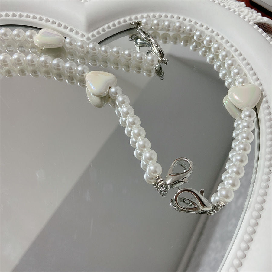 Eleganter Perlenbesetzter Brillenhalter Brehn