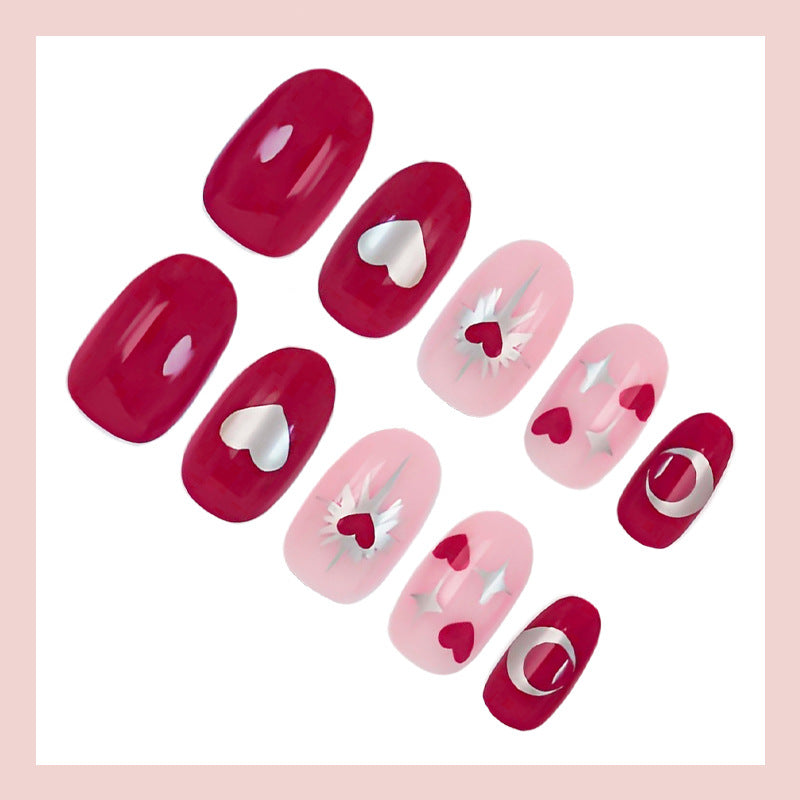 Kunstnagelset mit romantischen Herz- und Sternenmotiven Brehn