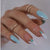 Künstlerisches Press-On-Nagelset mit eleganten Details Brehn