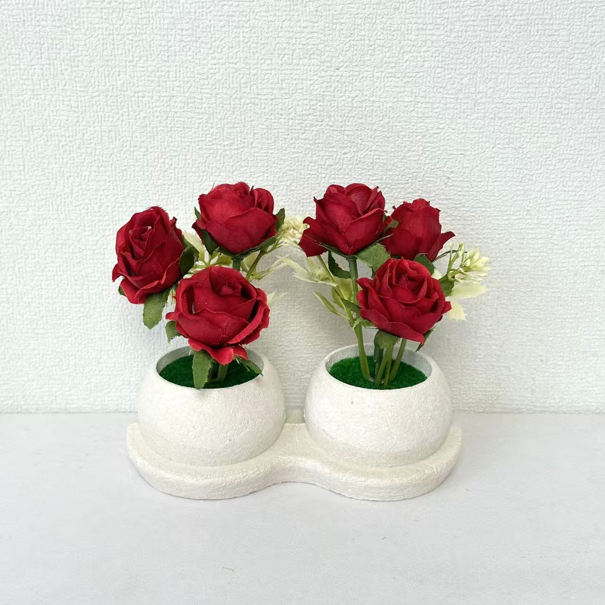 Elegante Blumenpflanzanordnung