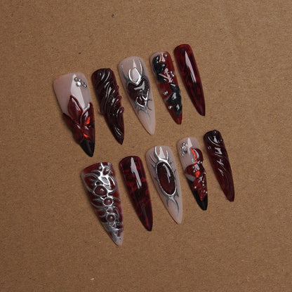 Kunstnagelset mit kunstvollen Designs Brehn