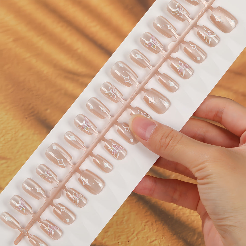Kunstnägel mit floralem und glitzerndem Design Brehn