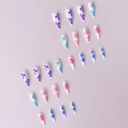 Kunstnagelset mit lebhaften 3D-Blütenmotiven Brehn