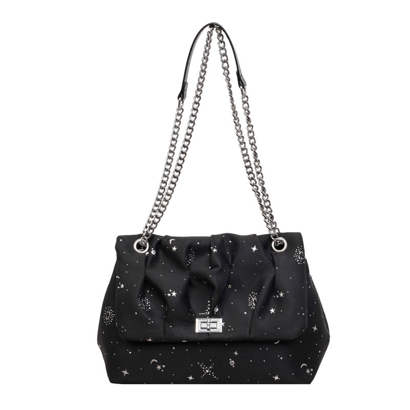 Stylische Handtasche mit Kettenakzenten