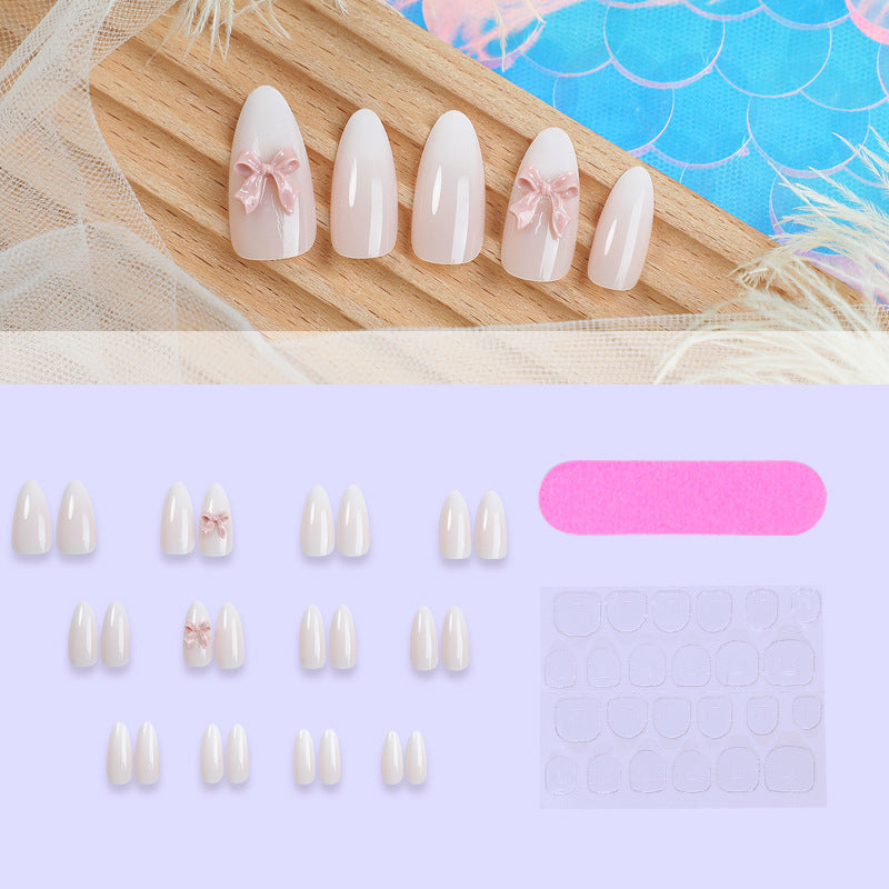 Elegantes Press-On Nail Art Set mit glänzender Oberfläche und süßen Schleifendetails Brehn