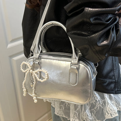Elegante perlenverzierte Handtasche