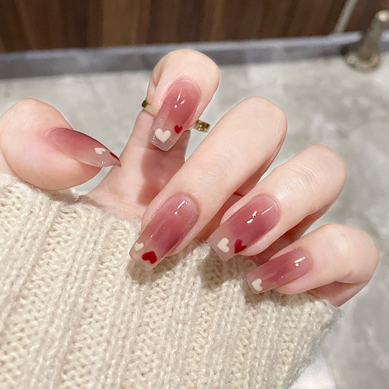 Kunstfingernägel mit Stilvollem Herz- und Ombre-Design Brehn
