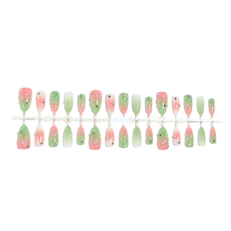 Kunstnagel-Set mit frühlingshaftem Design und Glitzerakzenten Brehn