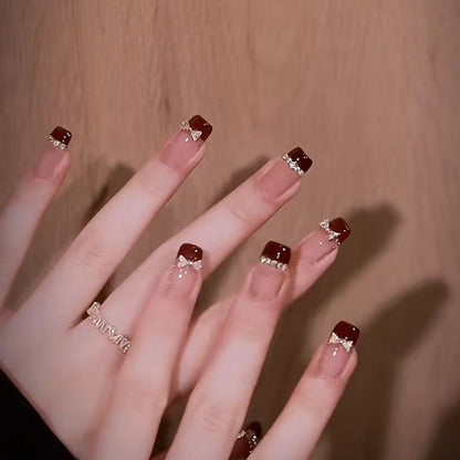 Elegantes mit Schleife verziertes Press-On Nagelset Brehn