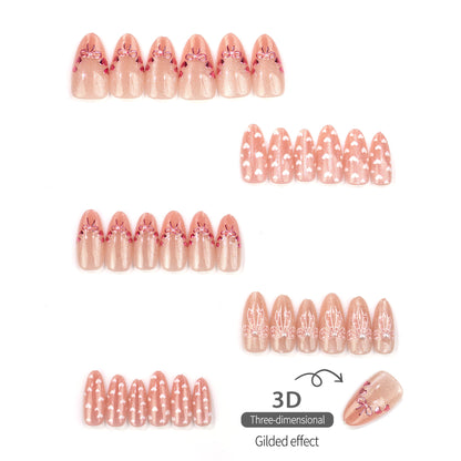 Dekoratives Press-On Nagelkunst Set mit Herz- und Schleifen-Designs