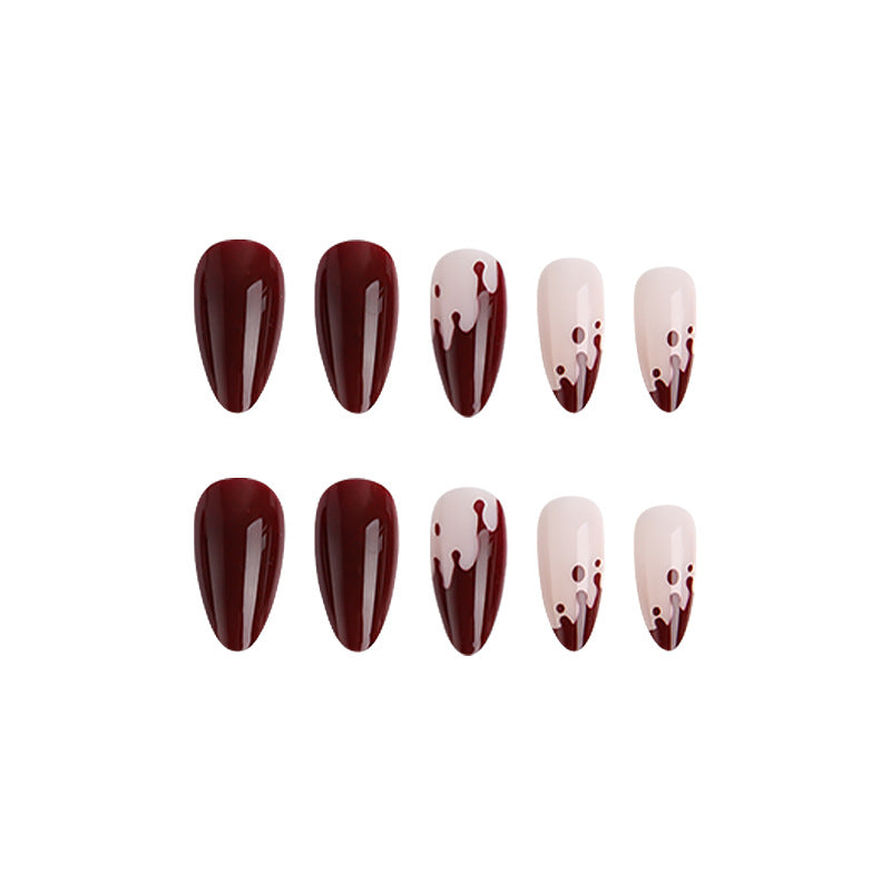 Kunstvolle Nagelspitzen mit Tropfen-Design Brehn