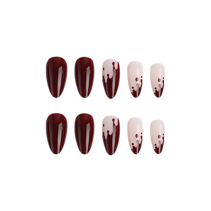 Kunstvolle Nagelspitzen mit Tropfen-Design Brehn