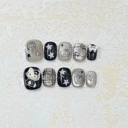 Spaß und verspieltes Press-On Nail Set mit Cartoon-Accents Brehn