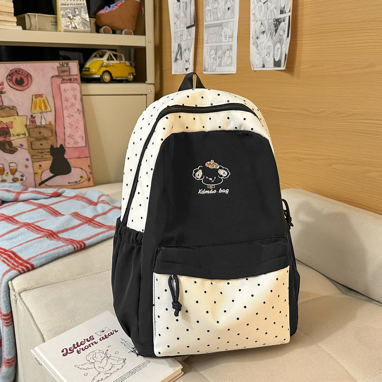 Spielerischer gepunkteter Rucksack Brehn