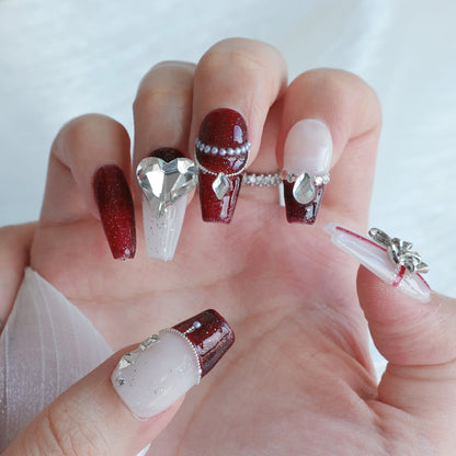 Dekoratives Press-On Nagelkunstset mit Schleifen- und Edelsteindetails