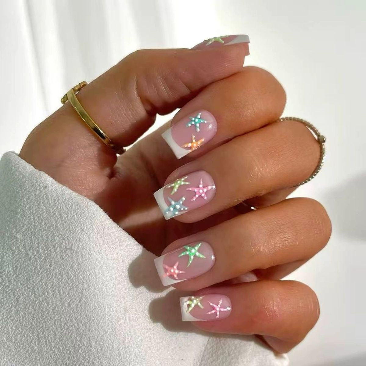 Elegante von Seesternen inspirierte Nagelkunst-Verzierungen Brehn