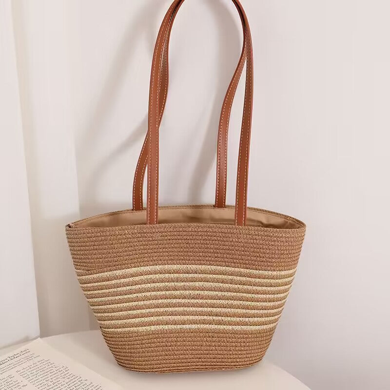 Elegante Bast-Handtasche mit Ledergriffen Brehn
