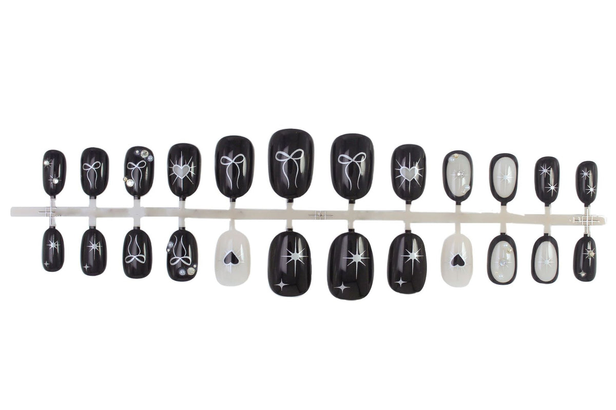 Kunstnagelset mit elegantem Schleifen- und Herzdesign Brehn