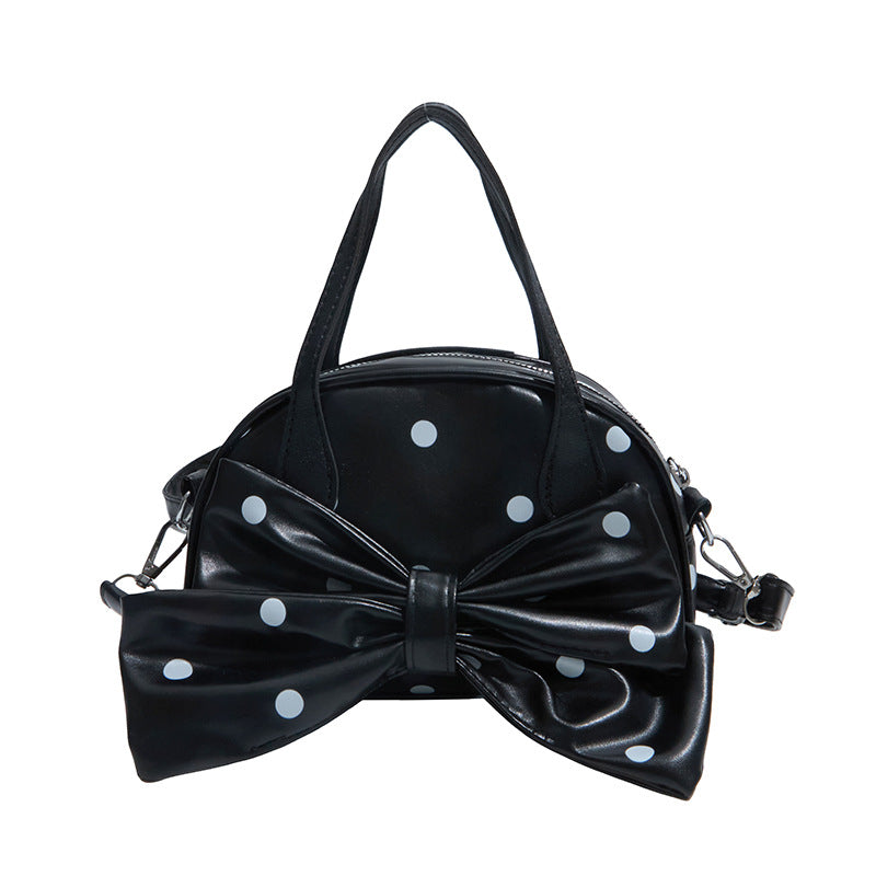 Schleifenverzierte Handtasche