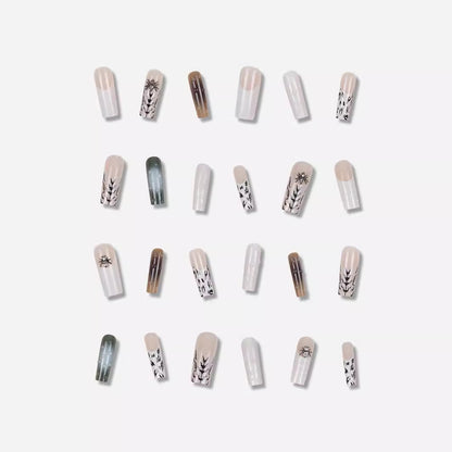 Künstlerisches Langes Stiletto Press-On Nagelset mit einzigartigen Mustern Brehn