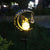 Crescent Moon Solar Gartensteckerlicht mit rotierender Crackle-Glas-Globus und Schmetterlingsakzent Brehn