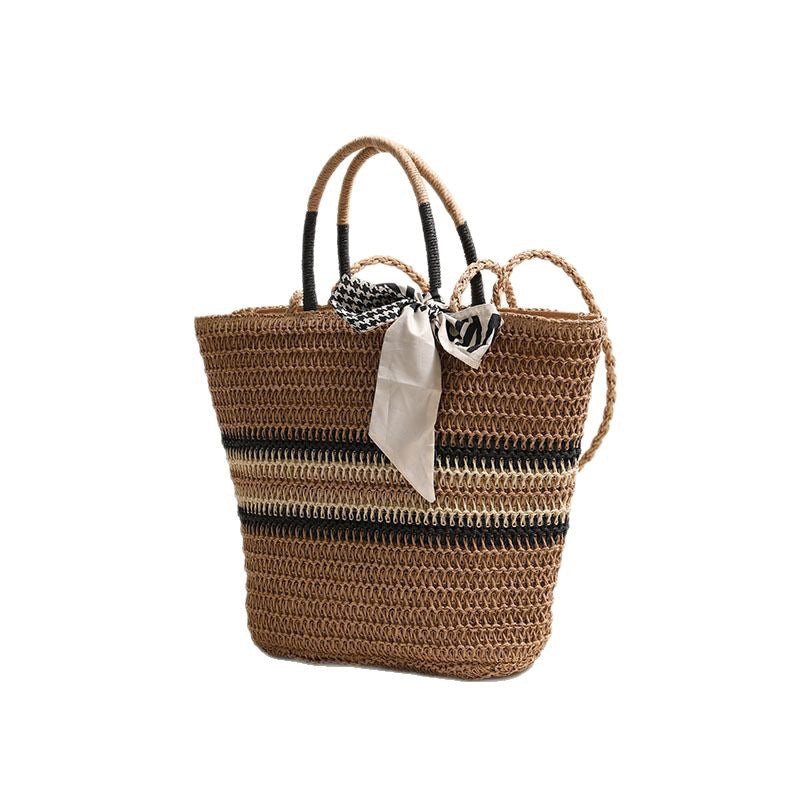 Damen Handtasche aus geflochtenem Naturmaterial mit modischem Akzent Brehn