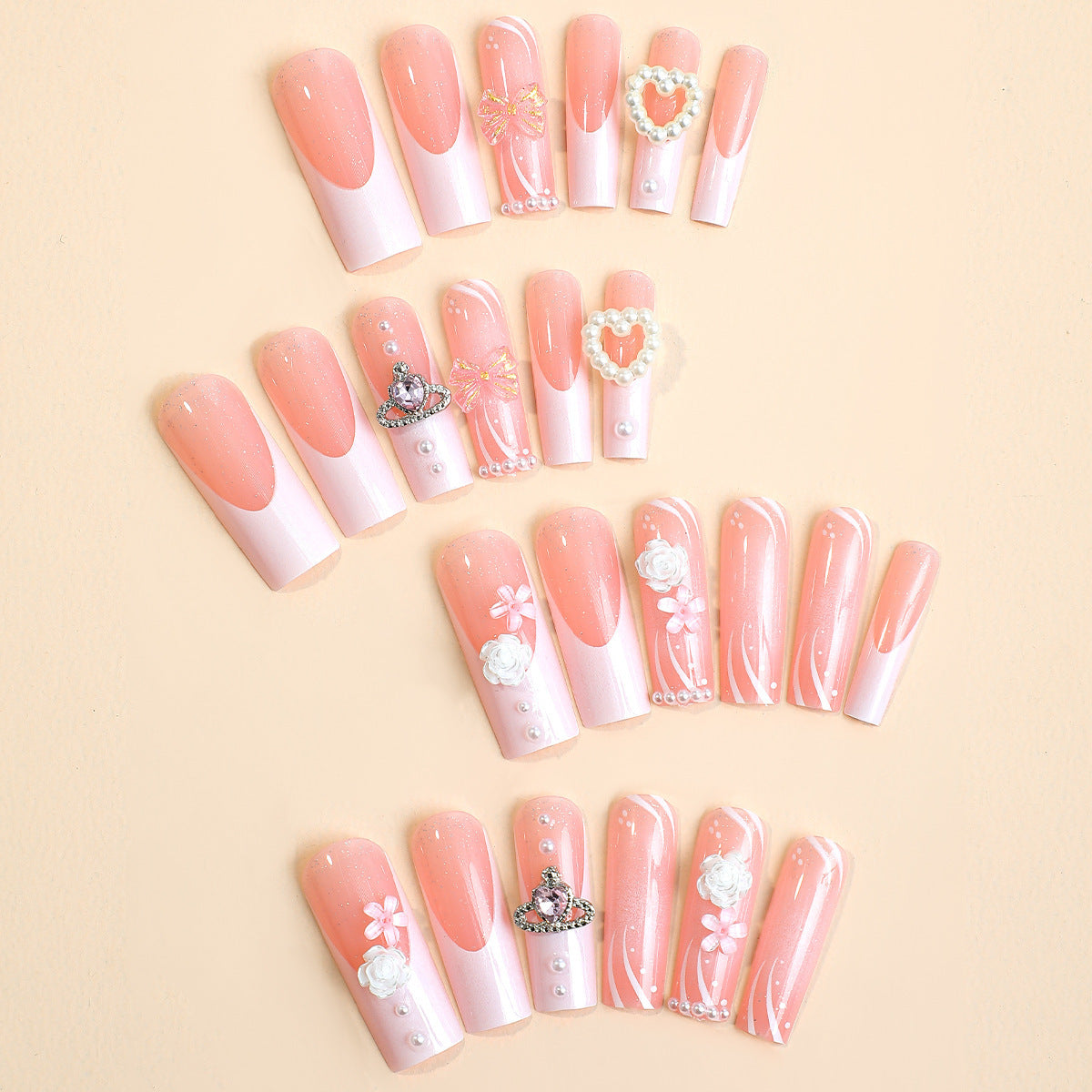 Kunstnagelset mit glamourösen Designs und dekorativen Applikationen Brehn
